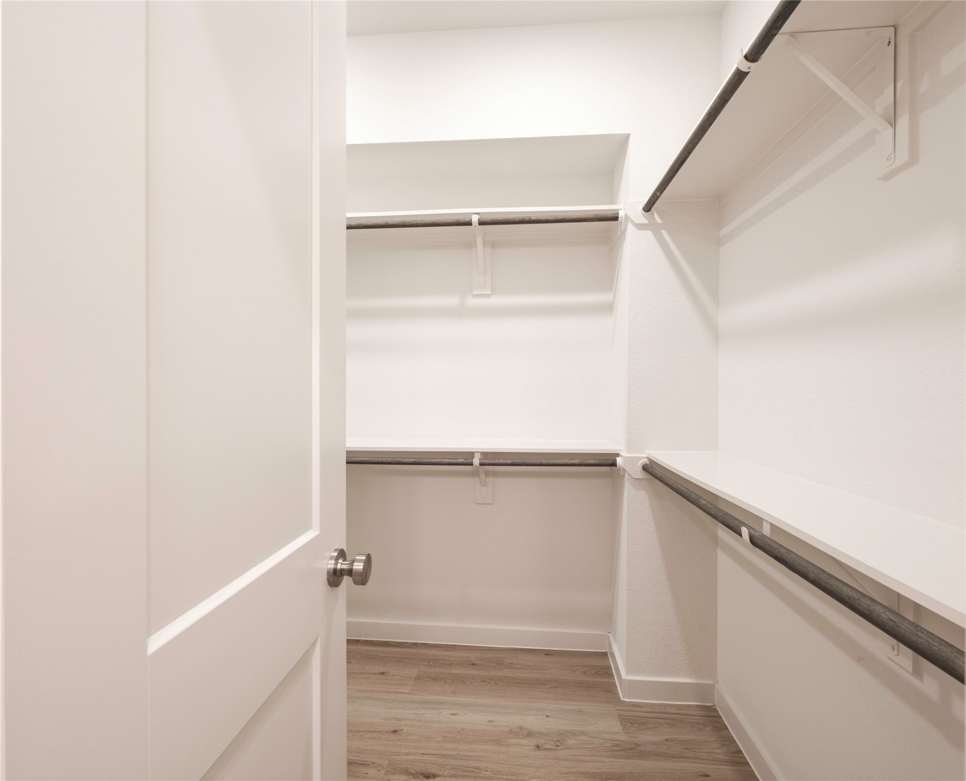 2517 Appian Way, Unit B Roman Forest, TX 77357 - Photo 22 of 31 a view of an empty walk in closet