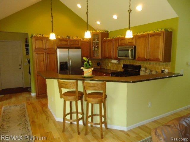 3799 Charles Huff Road Howell, MI 48855 - Photo 4 of 24 GOURMET MAPLE KITHCHEN