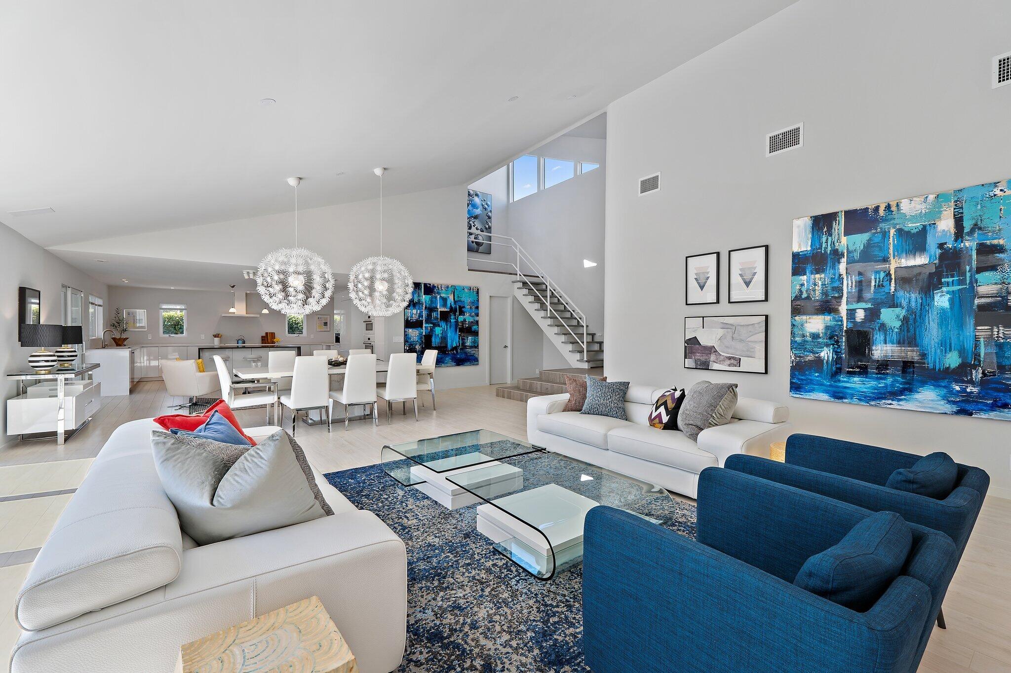 126 Orion Circle Jupiter, FL 33477 - Photo 32 of 82 a living room with furniture and a large window