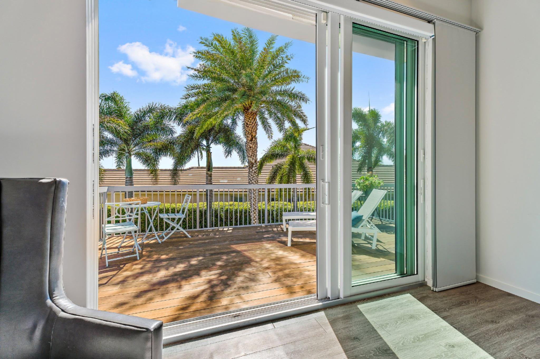 126 Orion Circle Jupiter, FL 33477 - Photo 45 of 82 a view of backyard from window