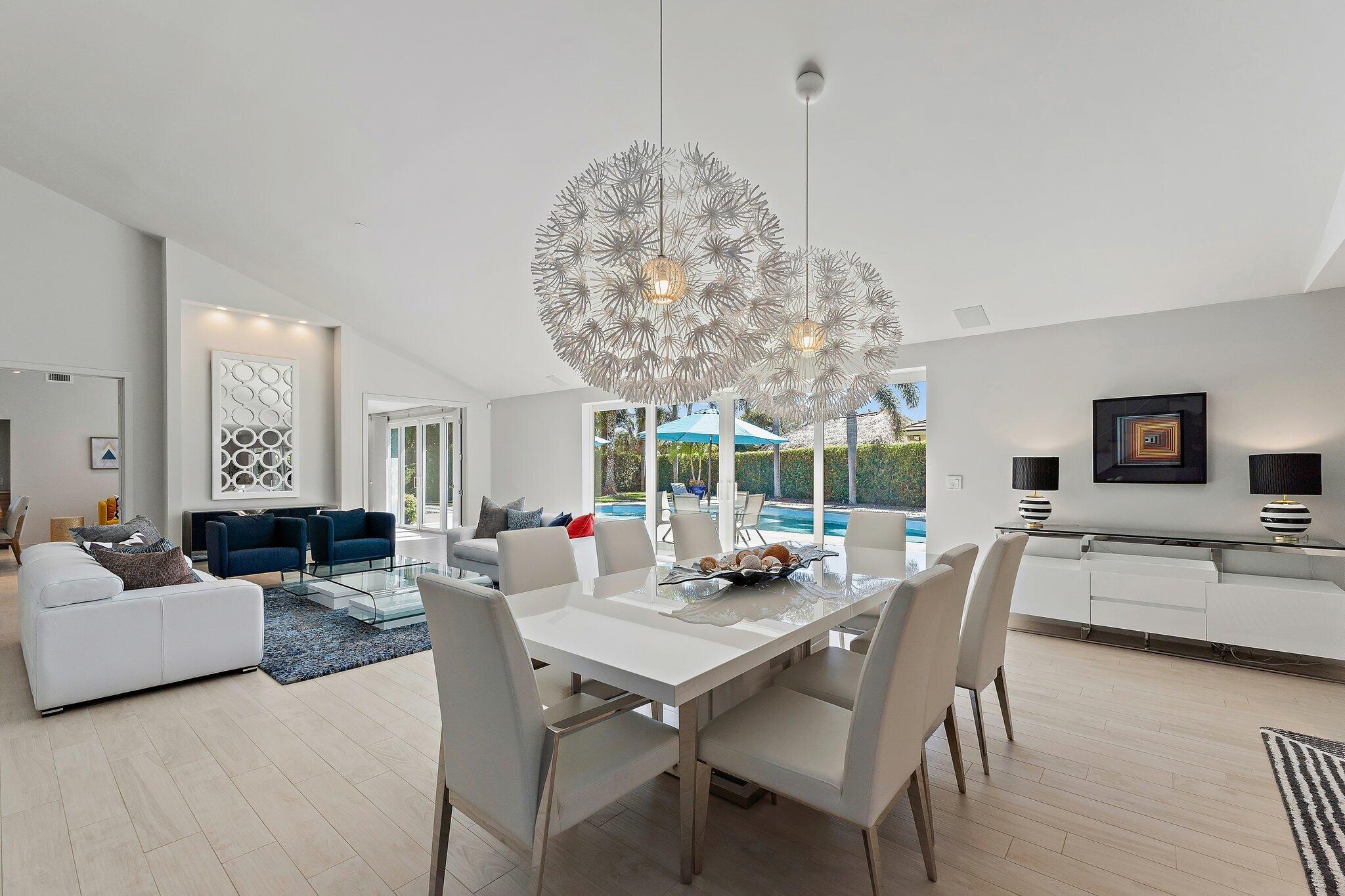 126 Orion Circle Jupiter, FL 33477 - Photo 6 of 82 a view of a dining room with furniture window and outside view
