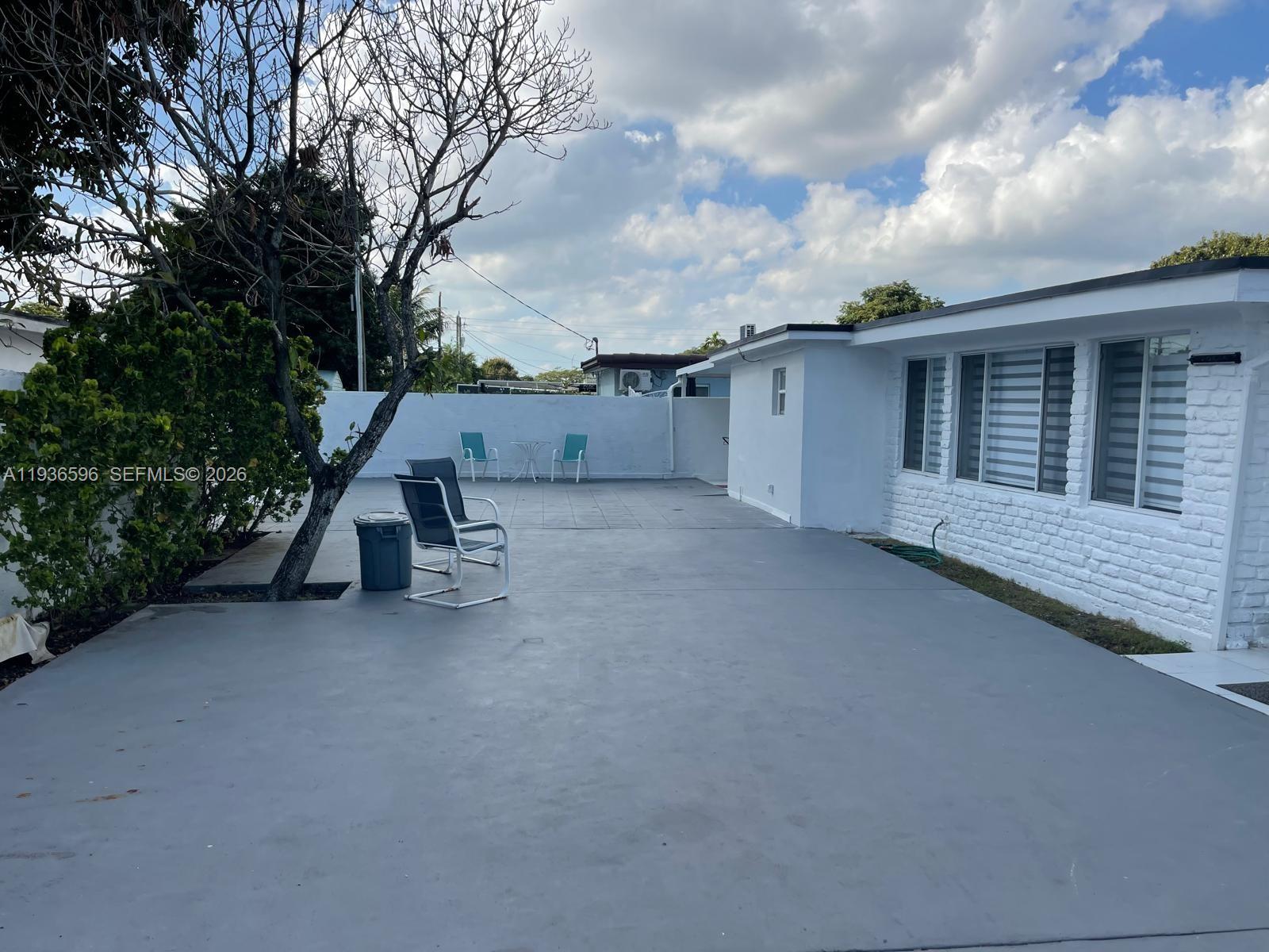 7410 Southwest 39th Street Miami, FL 33155 - Photo 39 of 47 a view of a house with a patio