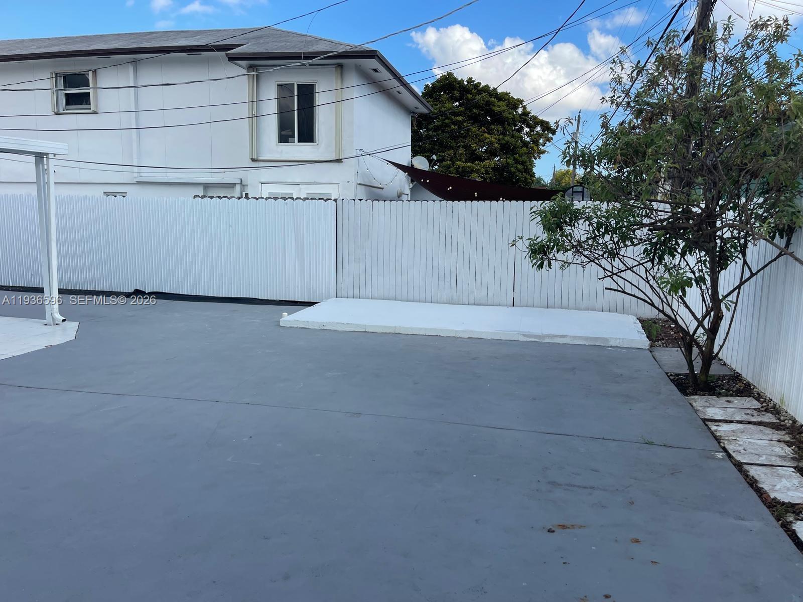 7410 Southwest 39th Street Miami, FL 33155 - Photo 41 of 47 a view of a house with a tree
