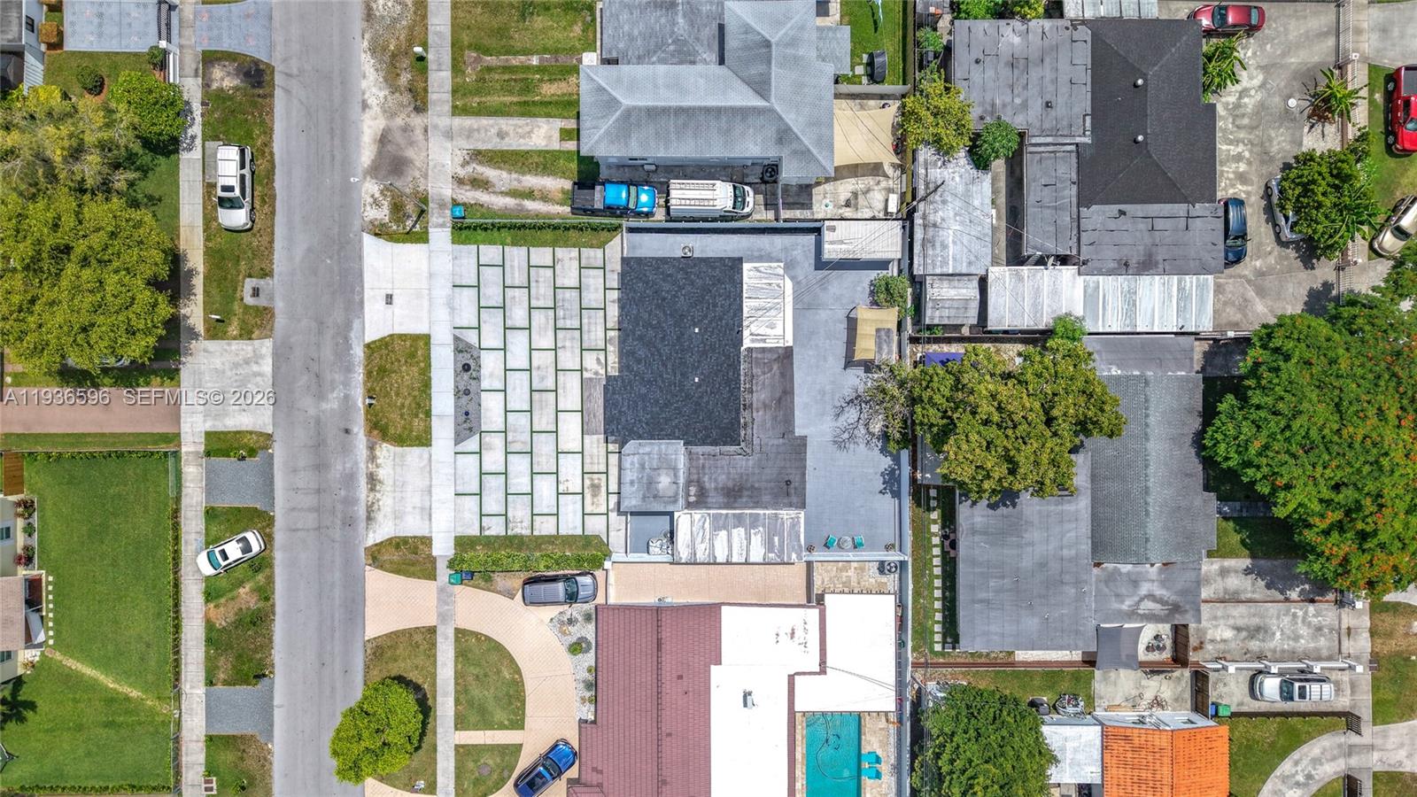 7410 Southwest 39th Street Miami, FL 33155 - Photo 42 of 47 front view of a building with potted plants