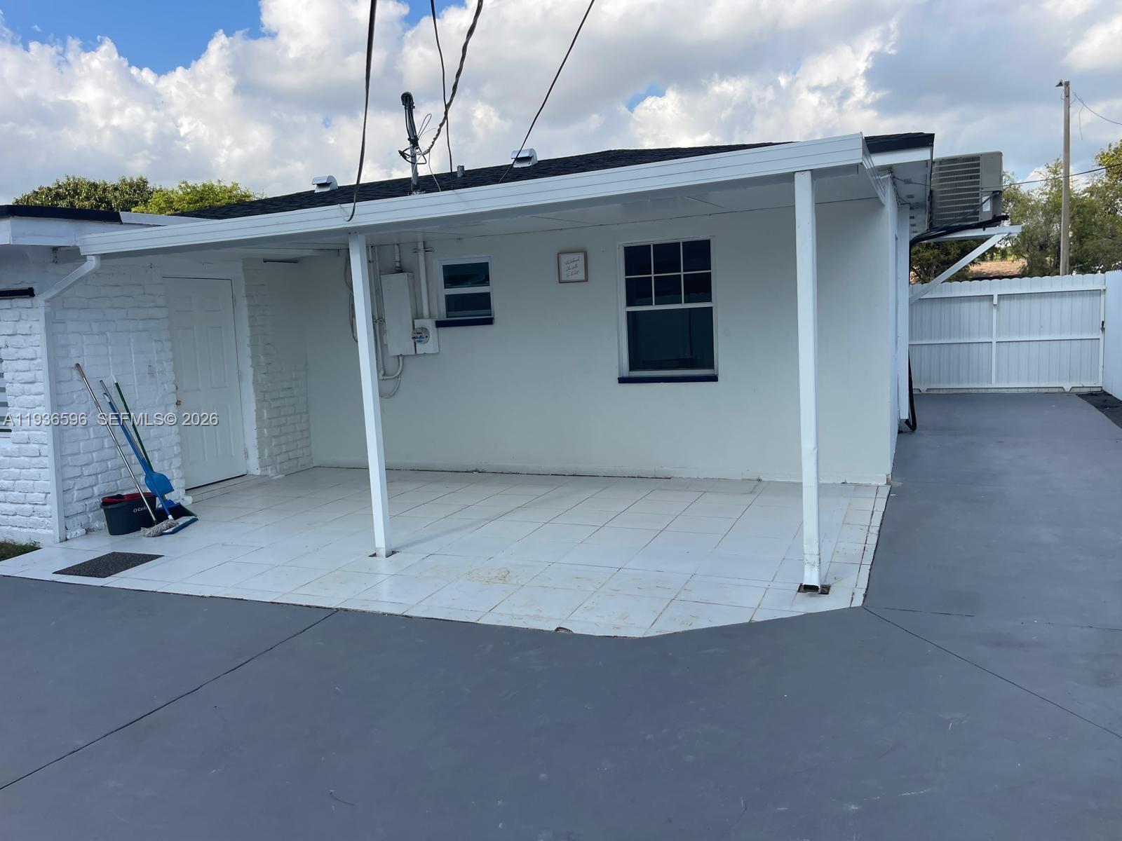 7410 Southwest 39th Street Miami, FL 33155 - Photo 46 of 47 a view of a house with a garage