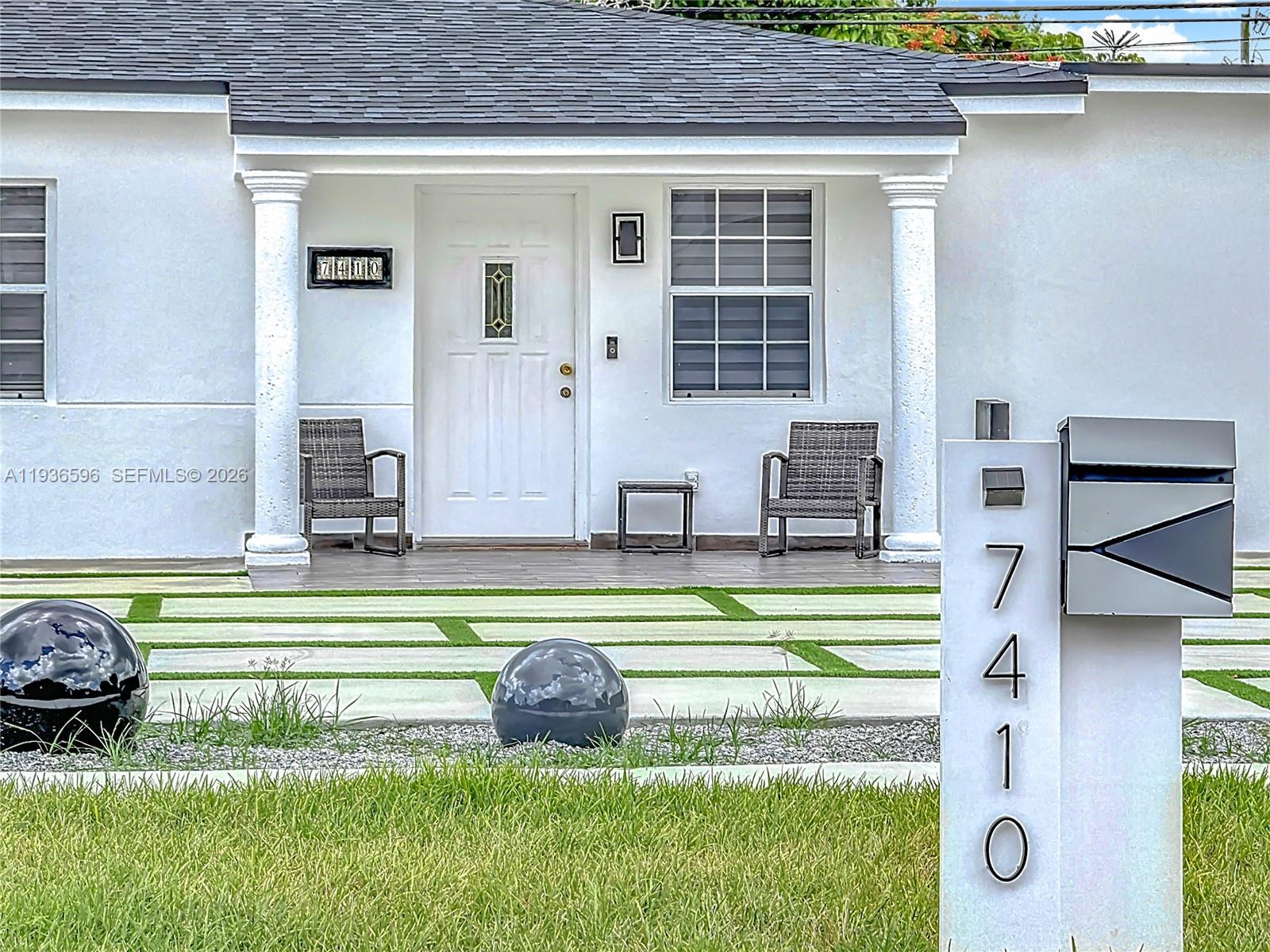 7410 Southwest 39th Street Miami, FL 33155 - Photo 5 of 47 a swimming pool with outdoor seating yard and barbeque oven