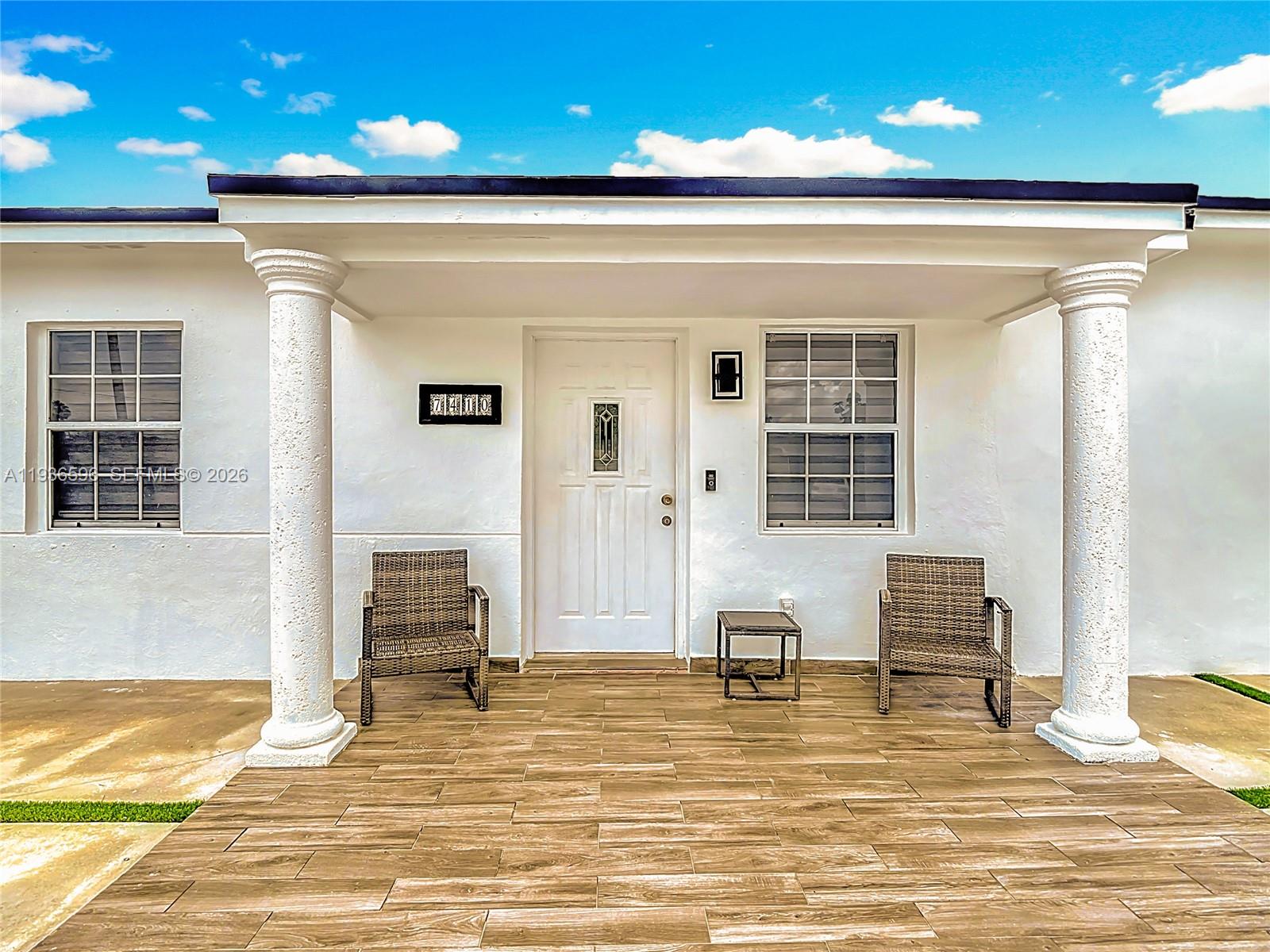 7410 Southwest 39th Street Miami, FL 33155 - Photo 7 of 47 a view of a livingroom with furniture and staircase