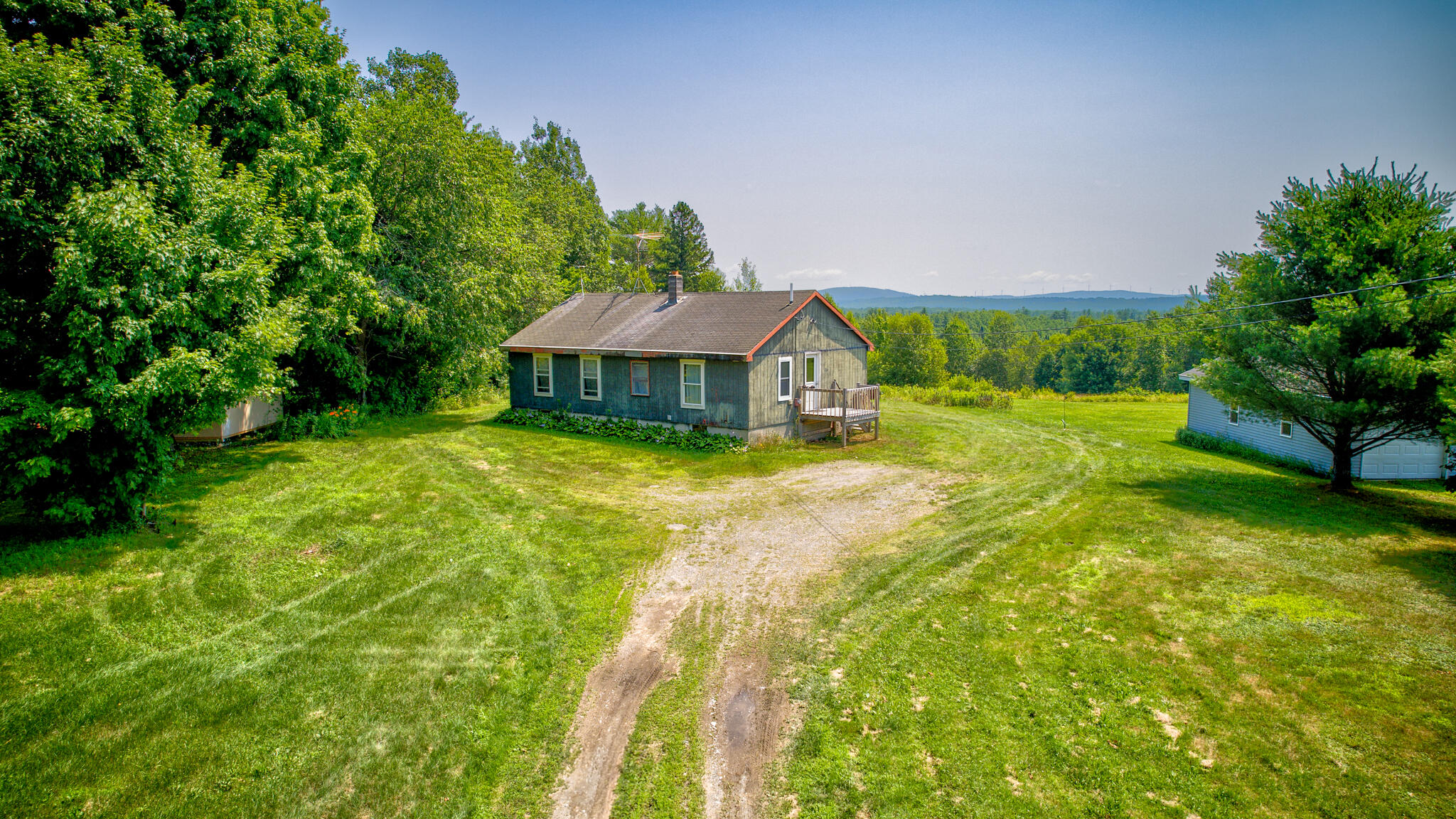 275 Pea Ridge Road Lincoln, ME 04457 - Photo 7 of 25 dji_fly_20240714_113204_613_172098020739