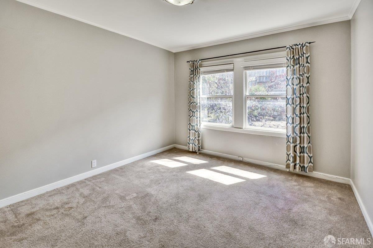 1770 17th Avenue San Francisco, CA 94122 - Photo 13 of 31 a view of an empty room with a window