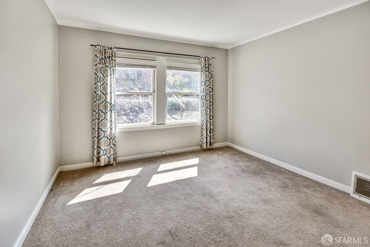 1770 17th Avenue San Francisco, CA 94122 - Photo 14 of 31 an empty room with windows