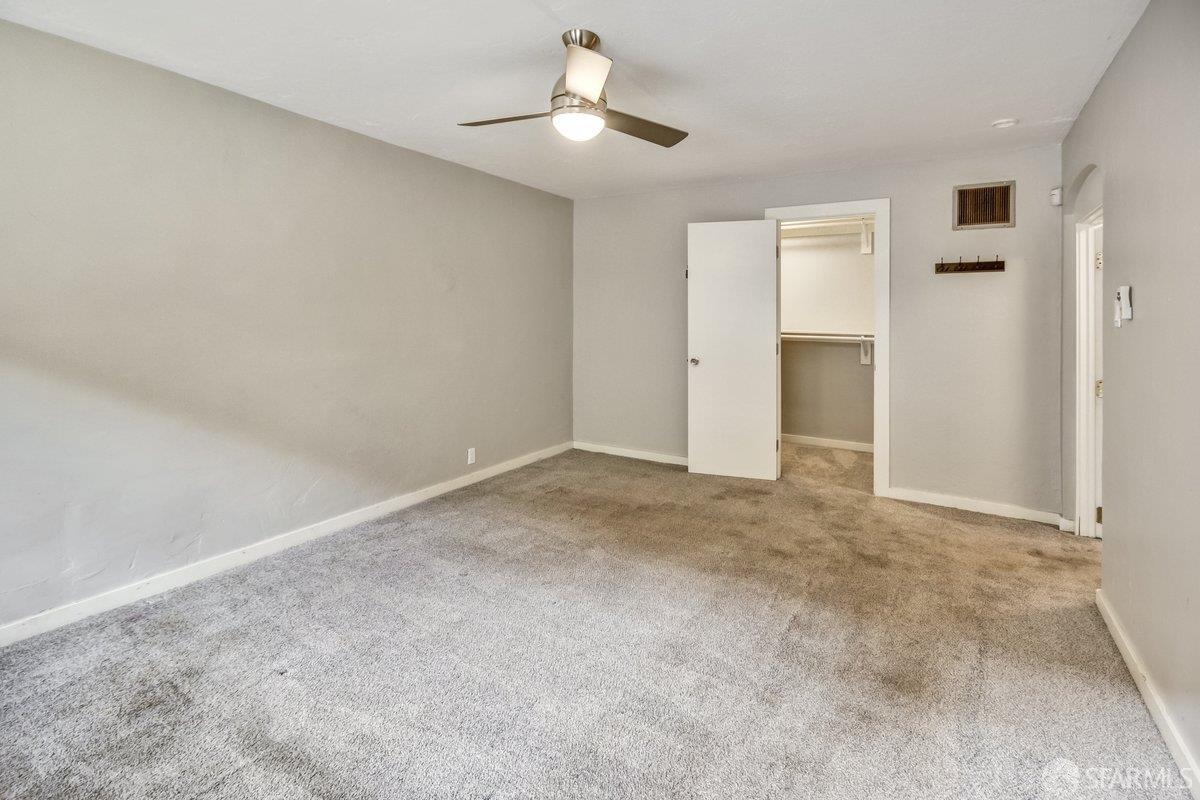 1770 17th Avenue San Francisco, CA 94122 - Photo 23 of 31 a view of an empty room and chandelier fan