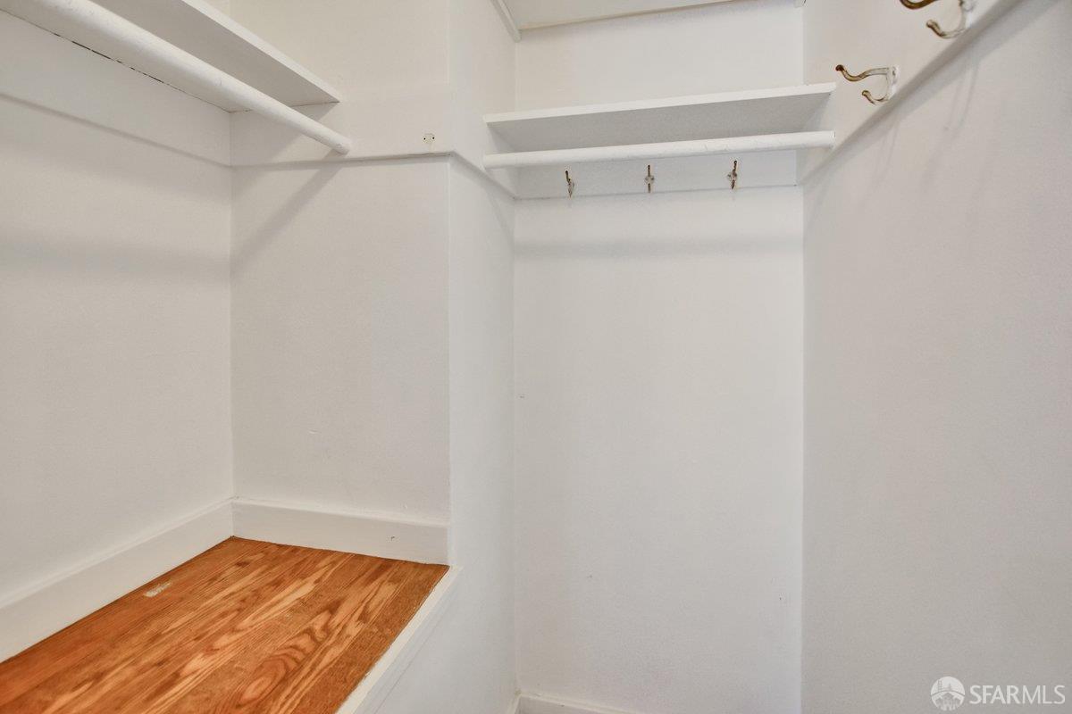 1770 17th Avenue San Francisco, CA 94122 - Photo 25 of 31 a view of walk in closet with empty racks