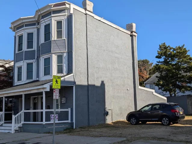 a car parked in front of a building