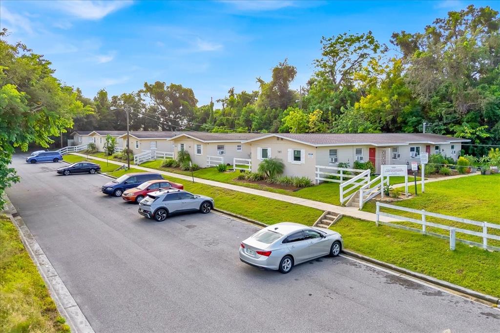 an outdoor space with furniture and garden