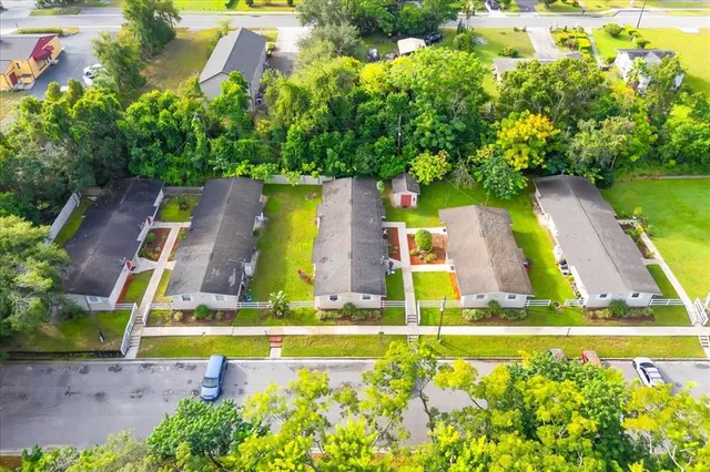 an aerial view of a house with a garden