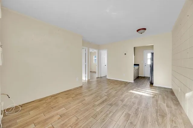 a view of an empty room and window