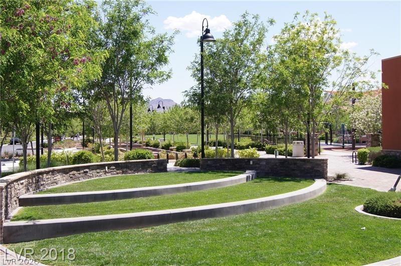 3144 Whitfeild Avenue Henderson, NV 89044 - Photo 34 of 55 Green spaces and pathways provide a pleasant outdoor setting with tiered grass seating.