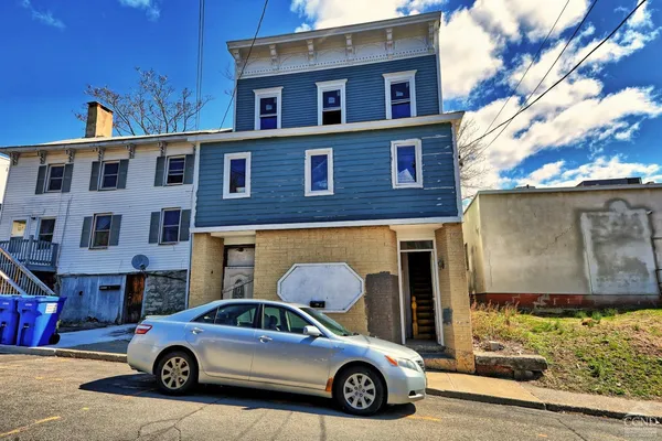 a car parked in front of a building