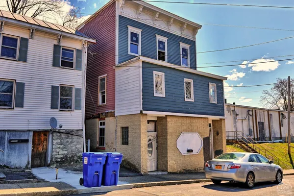 a car parked in front of a building