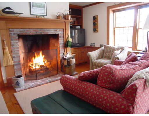 191 Wilder Road Bolton, MA 01740 - Photo 5 of 8 a living room with furniture and a fireplace