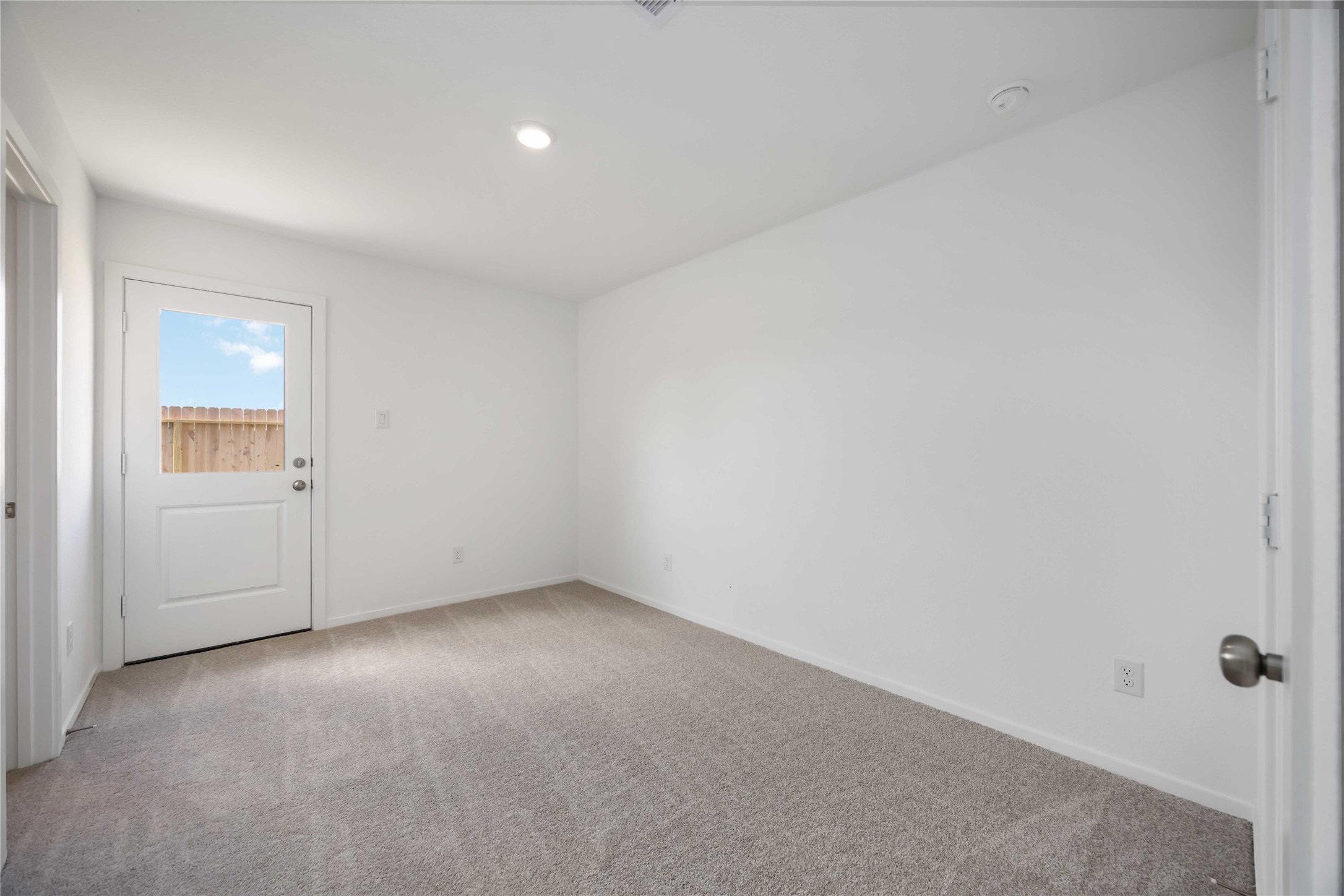 385 Lucia Way Cleveland, TX 77327 - Photo 22 of 30 a view of an empty room