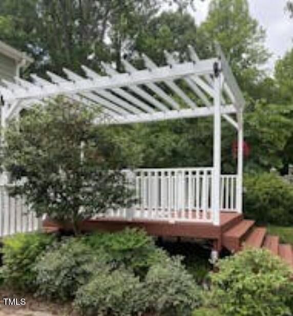 568 Log Barn Road Pittsboro, NC 27312 - Photo 18 of 25 a view of a chair and table in the backyard