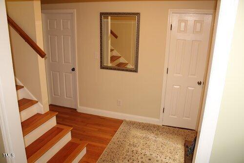 568 Log Barn Road Pittsboro, NC 27312 - Photo 8 of 25 a view of an entryway with staircase