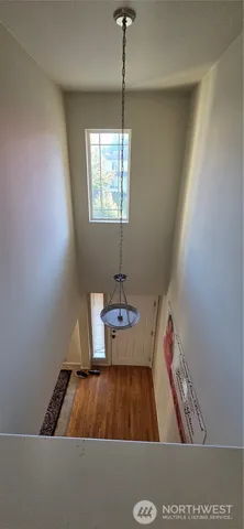 a room with window and ceiling fan
