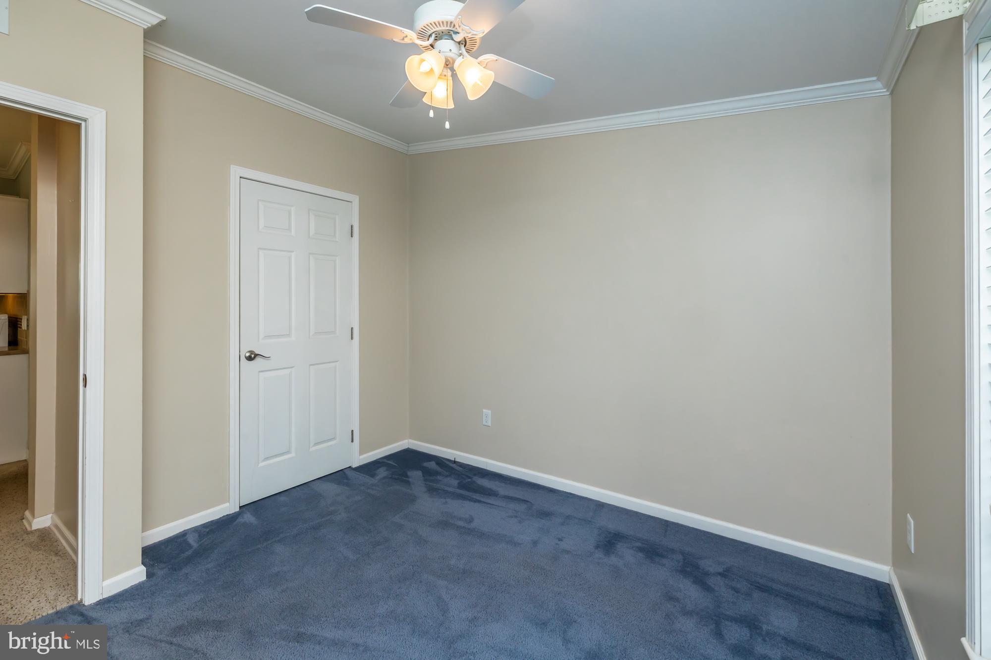 81 Westin Road Douglassville, PA 19518 - Photo 25 of 45 an empty room with a chandelier fan