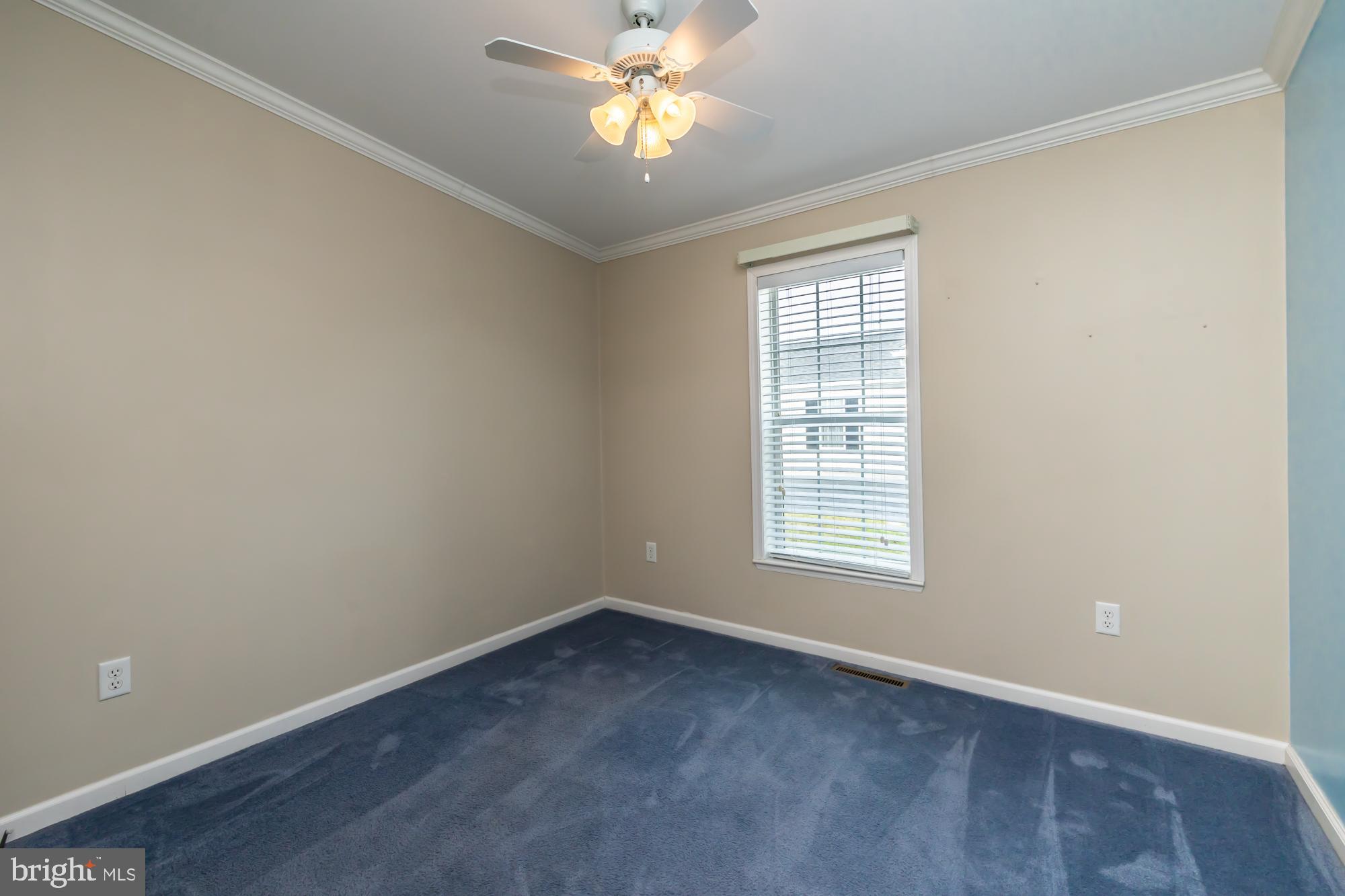 81 Westin Road Douglassville, PA 19518 - Photo 26 of 45 an empty room with a window and a fan