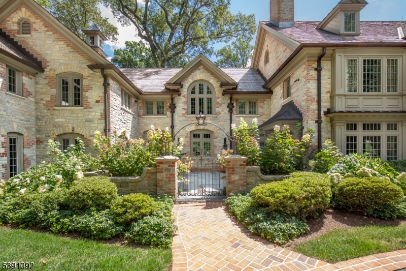 156 Overleigh Road Bernardsville, NJ 07924 - Photo 2 of 39 a front view of a house with garden