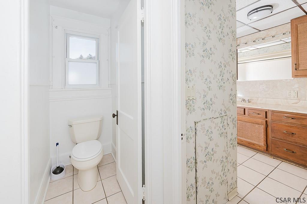 159 Wilson Street Johnstown, PA 15906 - Photo 15 of 27 a bathroom with a toilet sink and shower