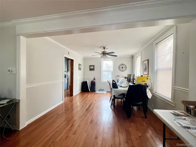 a view of a livingroom with furniture and wooden floor
