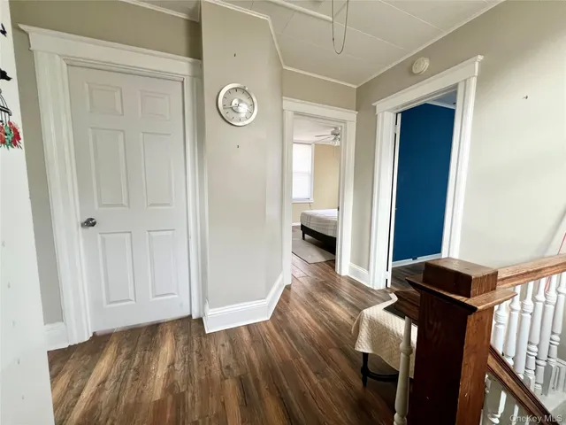 a view of a livingroom with furniture and wooden floor