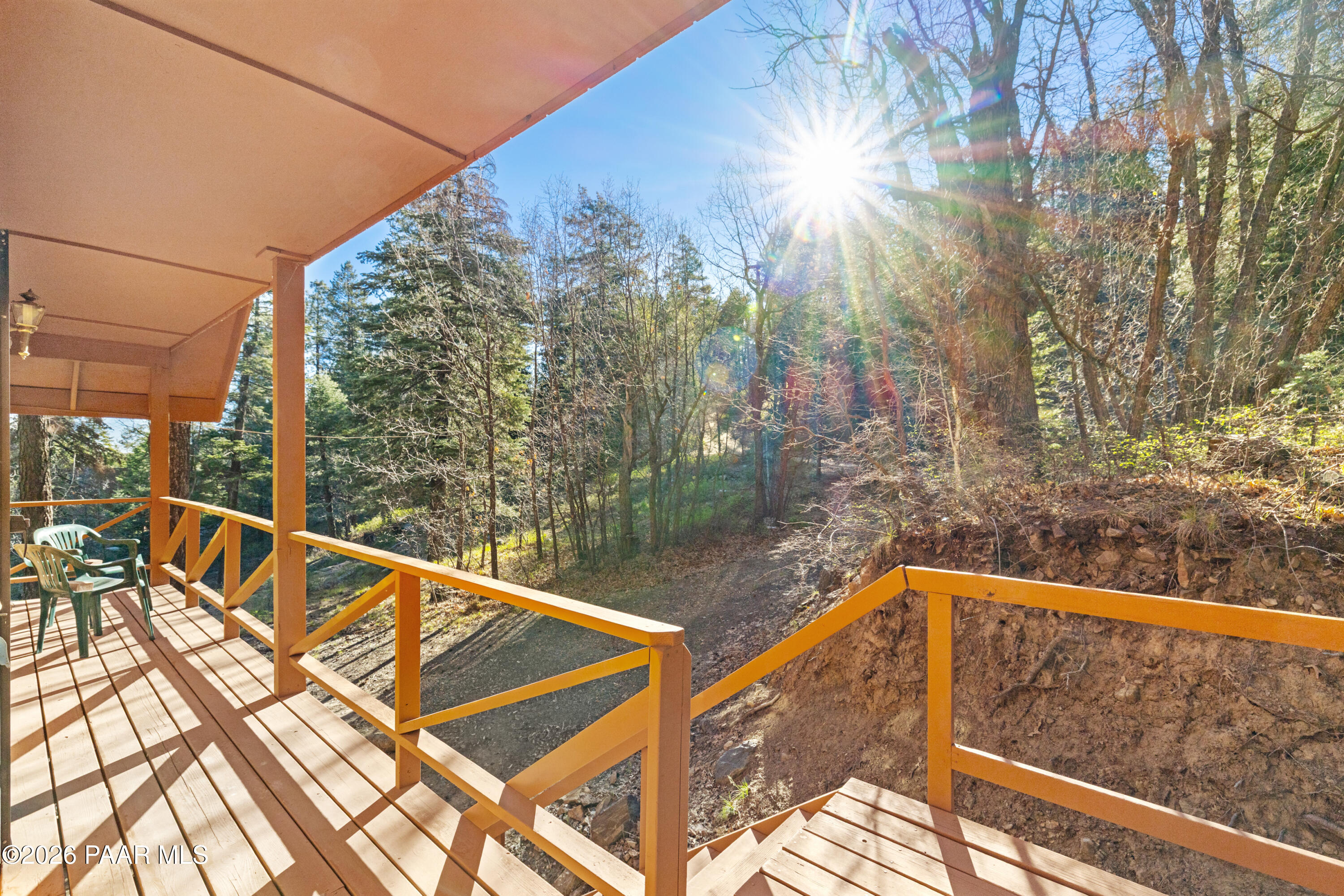 8520 South Hoot Owl Ridge Drive Prescott, AZ 86303 - Photo 3 of 25 a view of a balcony with trees
