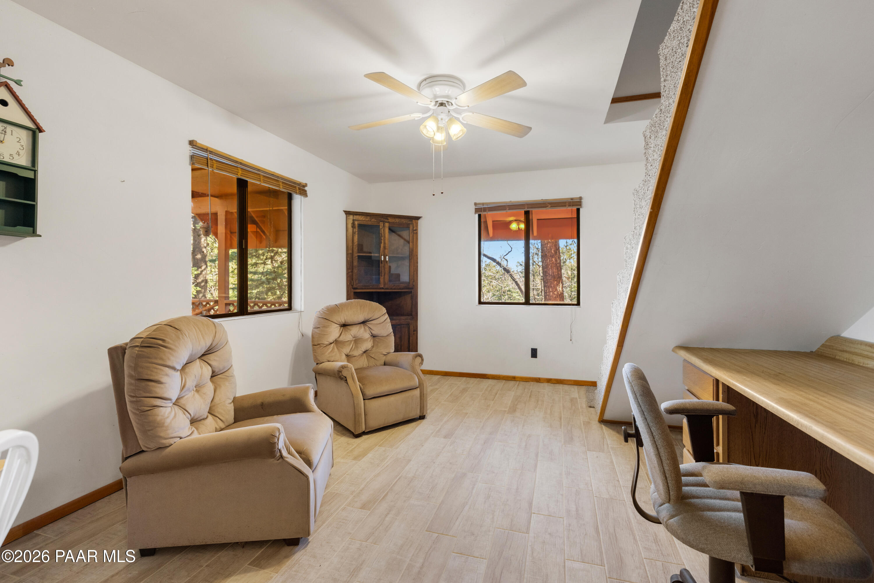 8520 South Hoot Owl Ridge Drive Prescott, AZ 86303 - Photo 9 of 25 a living room with furniture and a window