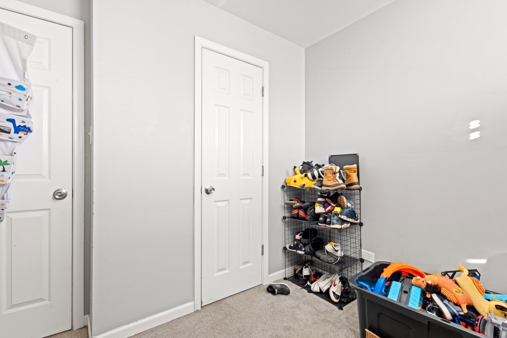 14564 Spaulding Avenue Harvey, IL 60426 - Photo 16 of 20 a room with toys and wooden floor