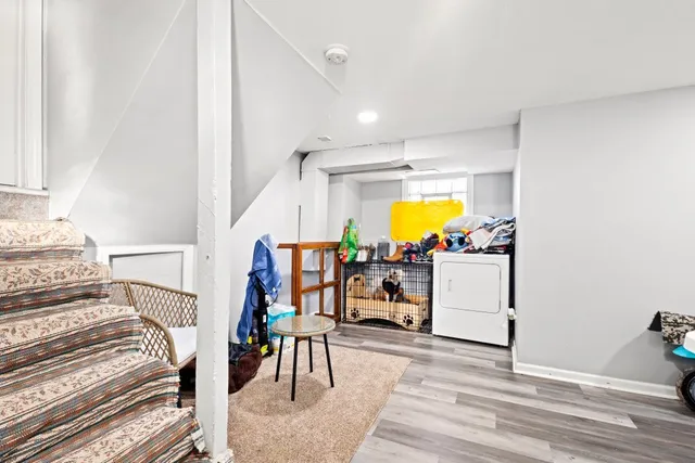 a view of living room with furniture and floor to ceiling window