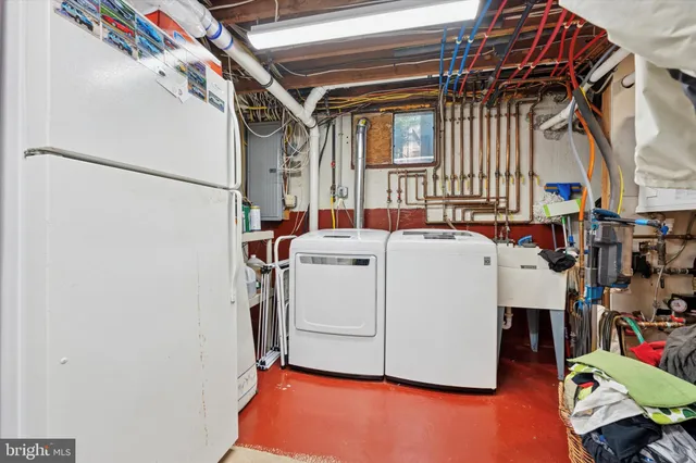 a utility room with dryer and washer