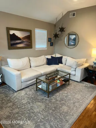 a living room with furniture and a couch