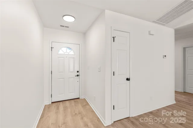 a view of a room with a wardrobe space