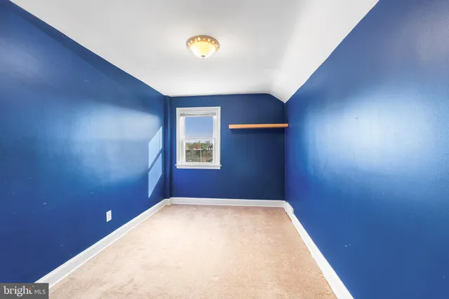 a view of a room with a window