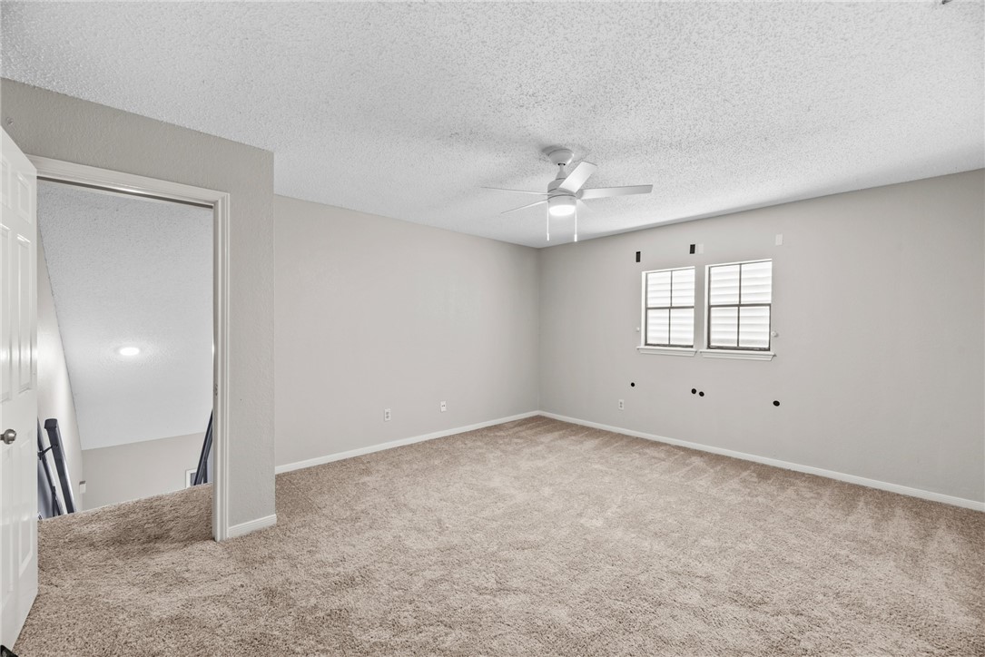 3025 Quail Springs Road, Unit B7 Corpus Christi, TX 78414 - Photo 14 of 23 a view of an empty room with a window