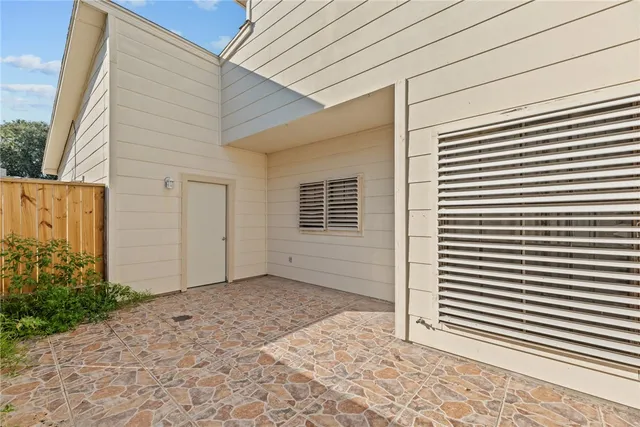 a view of a backyard of a house