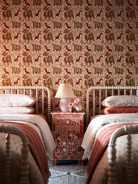 31 Worcester Street Boston, MA 02118 - Photo 25 of 30 a bed sitting in a bedroom next to a large window