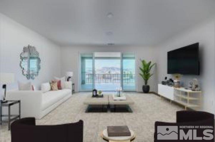 9257 Blue Basin Trail, Unit HOMESITE 16 Reno, NV 89521 - Photo 3 of 22 a living room with furniture and a flat screen tv