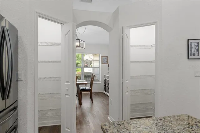 a bathroom with a bathtub and a window