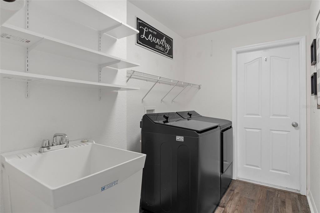 7 Bigleaf Court Homosassa, FL 34446 - Photo 42 of 71 a utility room with dryer and washer