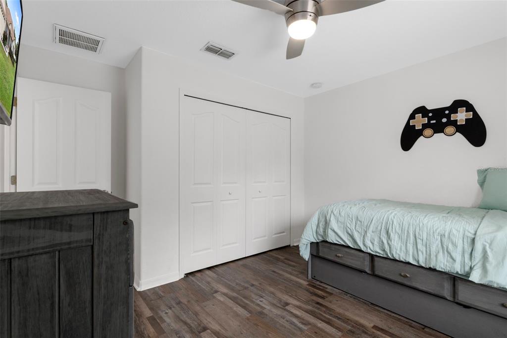 7 Bigleaf Court Homosassa, FL 34446 - Photo 47 of 71 a bedroom with a bed and a dresser