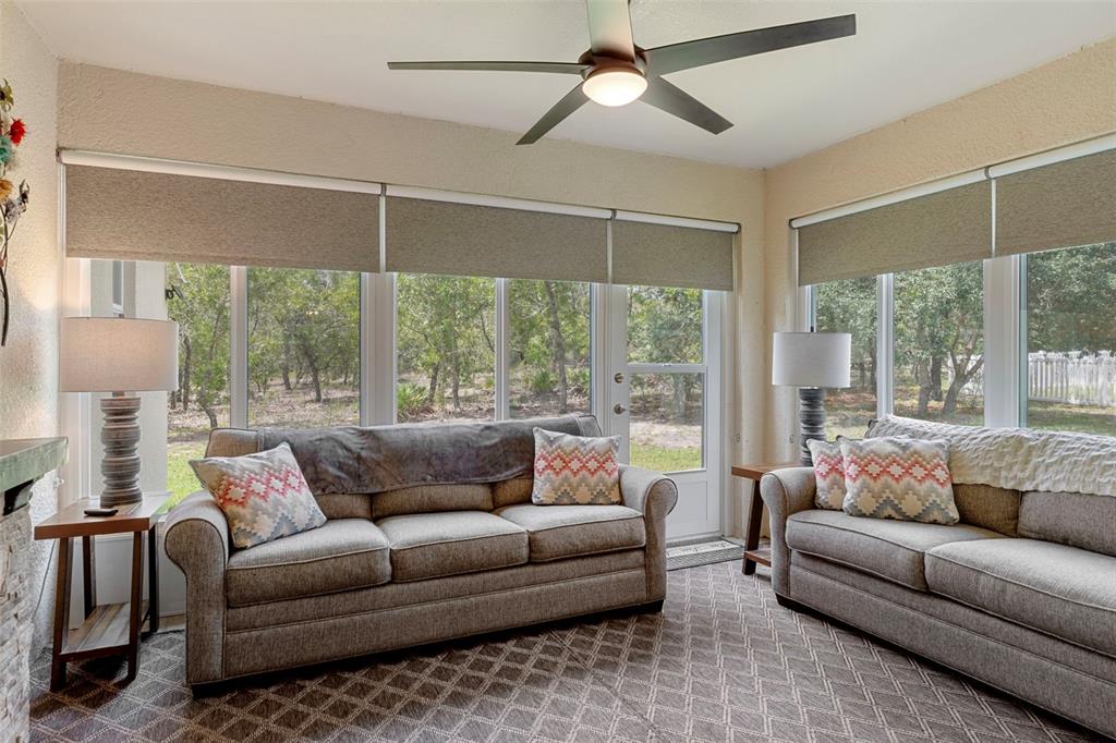 7 Bigleaf Court Homosassa, FL 34446 - Photo 51 of 71 a living room with furniture and a large window